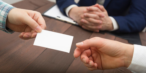 business executive exchanging business card blank. Copy space