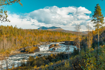 Målselvfossen waterfall in autumn