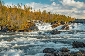 Målselvfossen waterfall in autumn