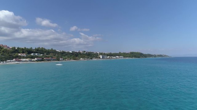 Aerial view of Kallithea village. During the summer, Kallithea is the most popular village in Halkidiki, Greece. 4K