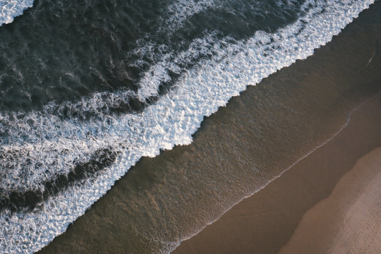 Bird eye view Atlantic ocean Portugal Peniche surfing sand beach Beleal