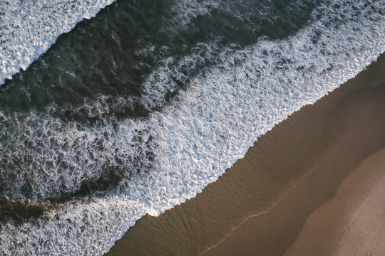 Bird eye view Atlantic ocean Portugal Peniche surfing sand beach Beleal