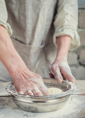 Process cooking dough for wheat bread. Bakers hands