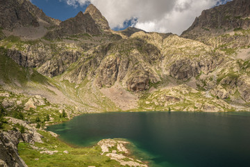 Naklejka na ściany i meble French Alps, Valley of Miracles, mountain lakes, pristine nature. Mercantour National Park