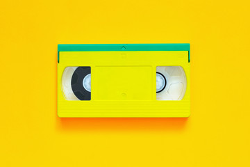 Video tape on colored background, VHS, cassette