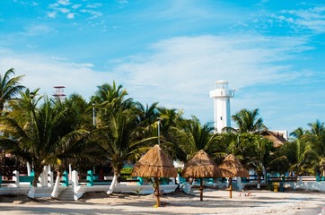 Lighthouse on the beach in Puerto Morelos, Mexico.