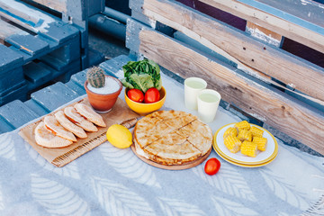 Morning picnic in the park. Tasty food. Snacks and fruits. Picnic basket. Lifestyles