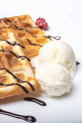Viennese waffles with ice cream, chocolate and cherry.