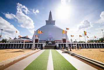  Budhism at Ruwanweliseya are praying, meditate. Anuradhapura, Sri Lanka. .
