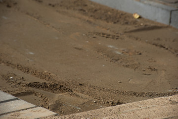 Place with sand for the installation of pavers