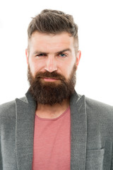 Dude fashion is pretty formulaic. Trendy hipster with mustache and long beard wearing fashion jacket and casual jeans. Bearded man in hipster fashion style. Man of fashion