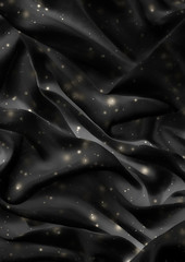 Magic holiday black silk flatlay background texture with golden shine, luxury glamour abstract...