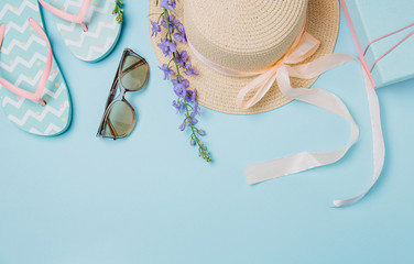 Summer subject photography. A hat, flip-flops and sunglasses