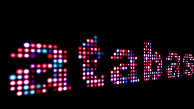 Database colorful led text over black