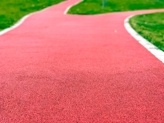 Red bike path in the park