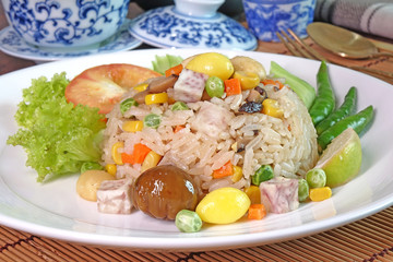 Eight immortals fried rice (or Baxian rice), Fragrance fried rice with chestnut, ginkgo biloba, mushroom, lotus seeds, sweet pea, taro, carrot and corns. Vegetarian food for vegetarian festival.