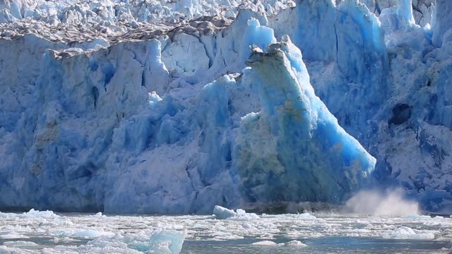 Huge piece of ice calves away from the Hubbard Glacier in Alaska
