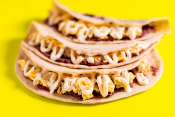 Closeup shot of Honduran baleada, traditional street food