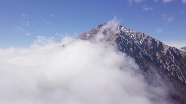 The view of Grigna Meridionale above the clouds, Lecco, Lombardy, Italy