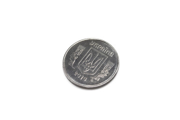 A close up image of a silver coin from Ukraine shot close up against a clean, white background