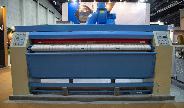 Commercial bed sheet laundry ironer flatwork equipment