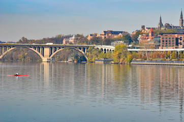 Washington D.C. in autumn foliage - Potomac River, Key Bridge and Georgetown in autumn trees.