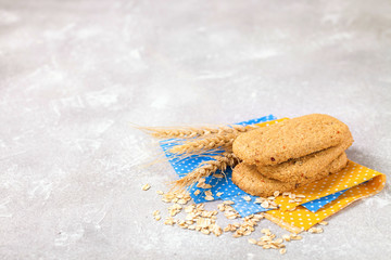 Dietary bars from porridge on a gray concrete background. Selective focus. Copy space