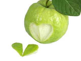 Fresh guava fruit isolated on white background. Heart-shaped carving. Medical and healthcare concept.