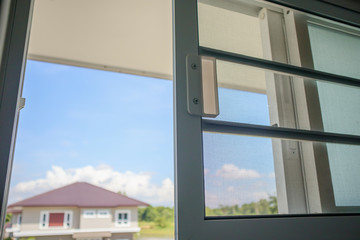 Open mosquito net wire screen on house window protection against insect