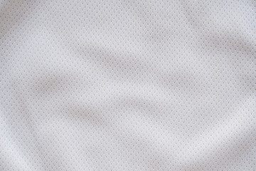 White fabric sport clothing football jersey with air mesh texture background - obrazy, fototapety, plakaty