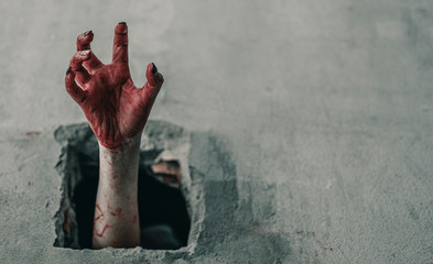 Horror Scene of a Woman with bloody hands in abandoned building, Halloween murder concept.