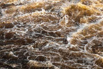 Background texture waves turbid water flowing.