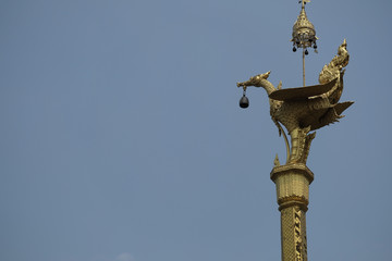 Fototapeta na wymiar Statue of a legend heaven bird at a pole top