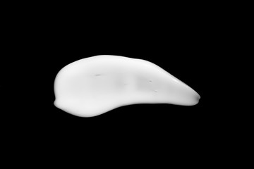 cosmetic cream isolated on a black background