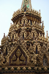 Fototapeta na wymiar Thai fine arts at upper part of a pagoda