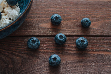 fresh big blueberries on wooden background