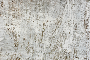 Fototapeta premium Texture of a concrete wall with cracks and scratches which can be used as a background
