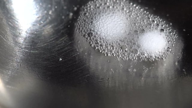 From the tablets, drugs are boiled in a spoon over a gas burner