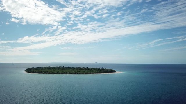 Aerial shot, flying closer to the Serenity Island in Fiji