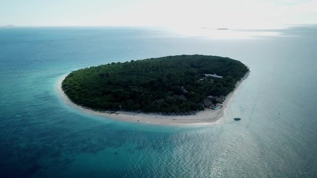 Aerial Orbit shot of the Serenity Island in Fiji