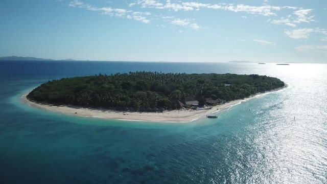 Aerial Orbit shot of a beautiful Serenity Island in Fiji