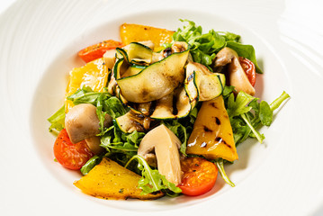 salad from grilled vegetables and arugula