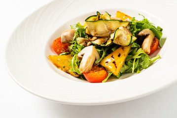salad from grilled vegetables and arugula