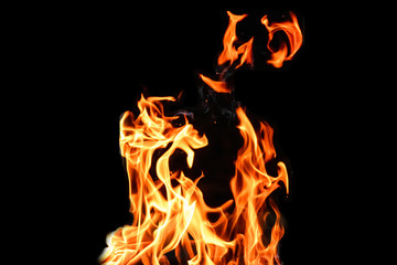 Fire, flames on a black background isolate. Concept fire grill heat weekend barbecue.