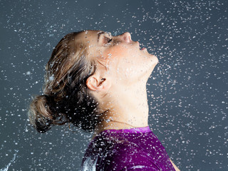 expressive woman with falling water droplets