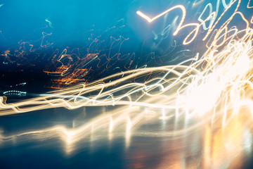 Defocused glow. Blur shiny yellow lines. Abstract art background.