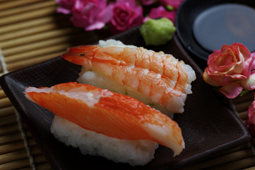 The seafood sushi serving with soy sauce and wasabi