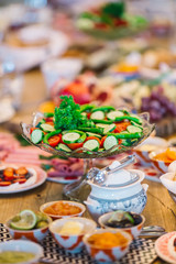 Brushettas, Cheese Varieties, Mediterranean Olives, Pickles, Bowl of Prosciutto di Parma and jams