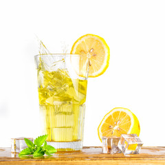 fresh ice lemonade and lemon on white background