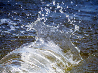 Water splash on river, summer time